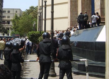 Police watching the protest. 