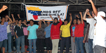 The meeting ended with a spirited singing of the Internationale with all the workers standing and raising their fists.