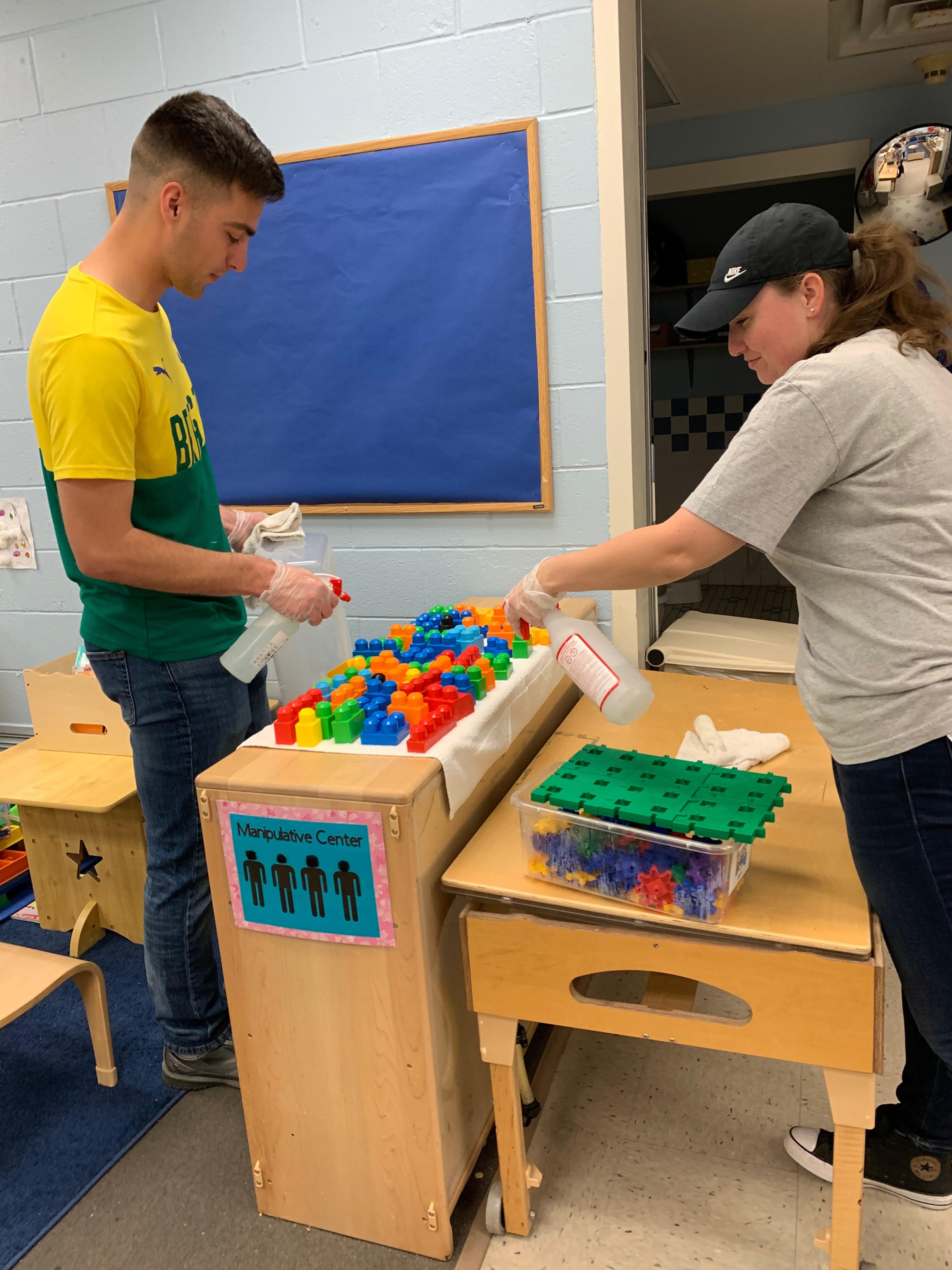 Sanitizing school covid Image Senior Airman Seraiah Wolf AETC