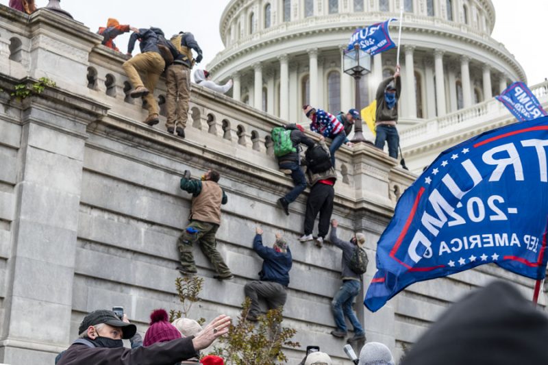 Trump mob storms capitol climb wall Blink Ofanaye Flickr