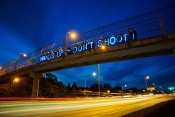 Ferguson hands up dont shoot-light brigading