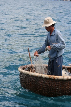 People, usually foreigners or local businessmen, could no doubt spend a fisherman’s entire yearly income during an extravagant weekend on the beach. Photo by maurice koop on Flickr.