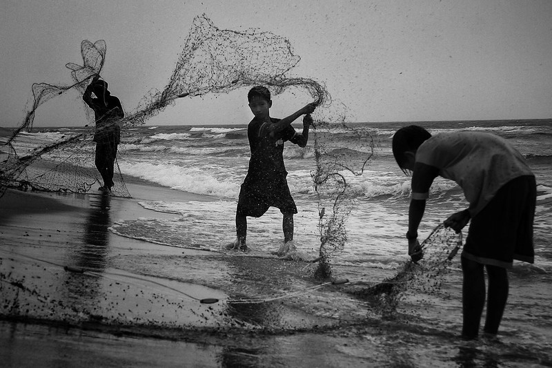 child fishing Image ILO Flickr